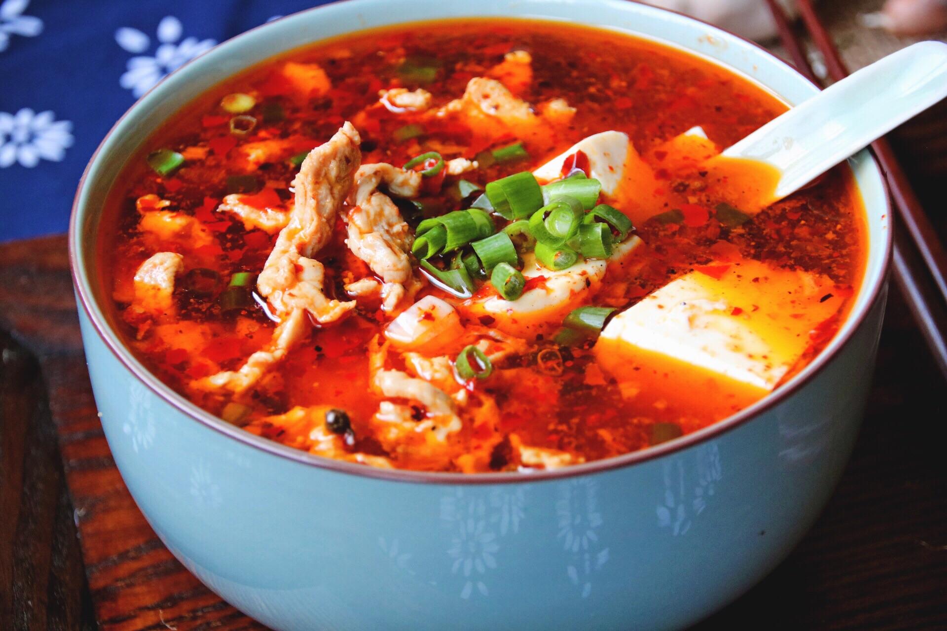 丝滑软嫩的麻辣体验：豆花水煮肉片